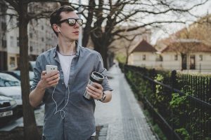 Man walking with smart phone